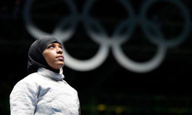 Ibtihaj Muhammad prepares for a match at the Summer Olympics in Rio de Janeiro