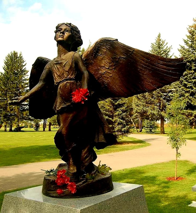 Christmas Box Angel Statue at Fielding Memorial Cemetery on South Yellowstone Blvd