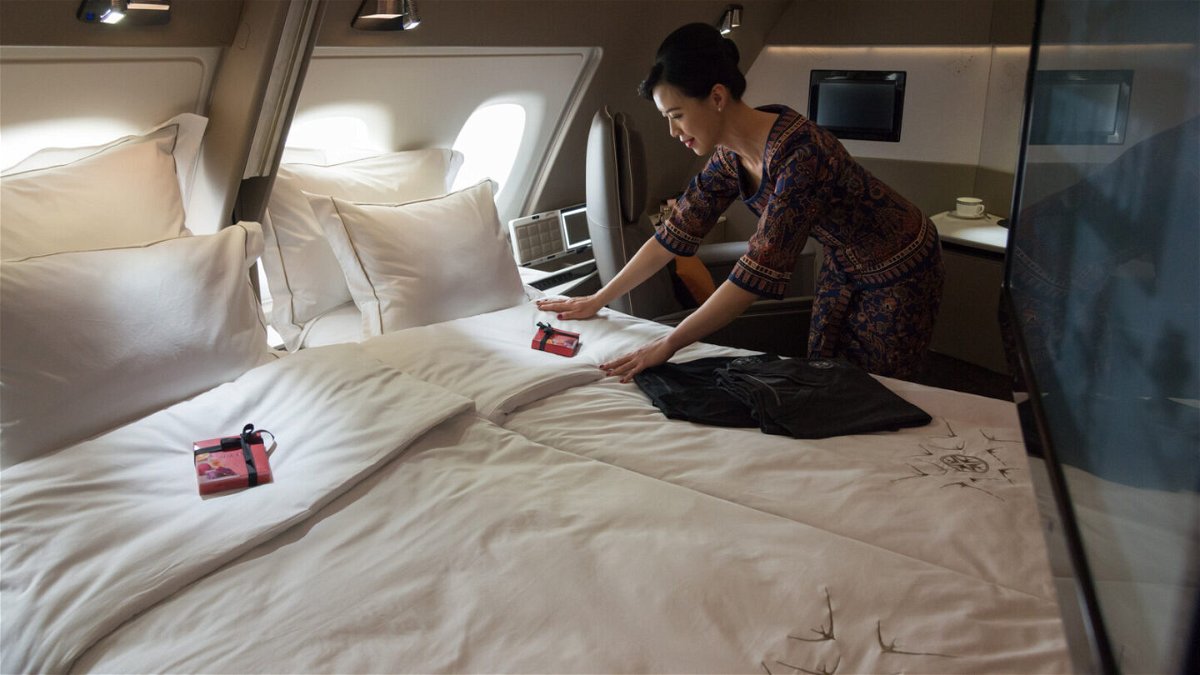 <i>TOH TING WEI/AFP via Getty Images</i><br/>American Airlines is dropping first-class seats on international flights in favor of new-and-improved business class suites