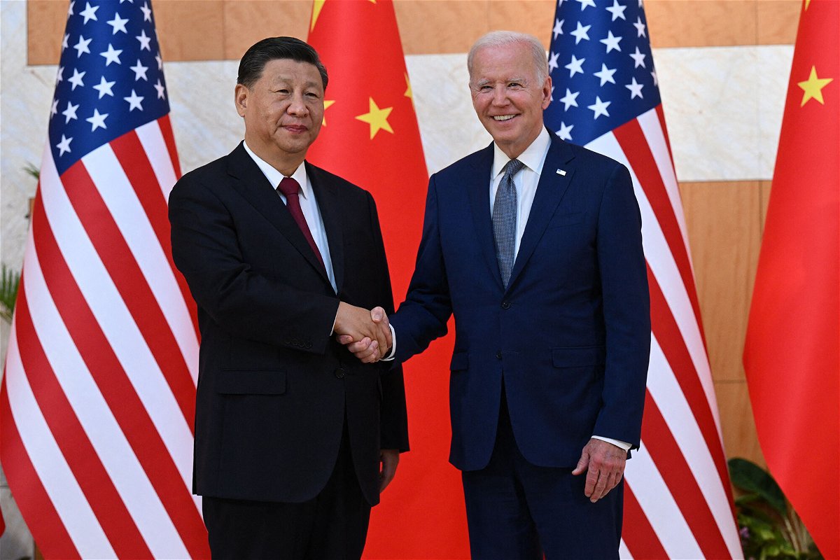 <i>Saul Loeb/AFP/Getty Images</i><br/>President Joe Biden (R) and China's President Xi Jinping shakes hands as they meet on the sidelines of the G20 Summit in Bali