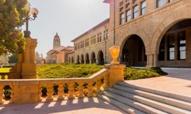 Stanford University is reviewing its safety procedures after a man was caught living illegally in dorms. Pictured is the Main Quadrangle and Hoover Tower on the campus of Stanford University on October 2