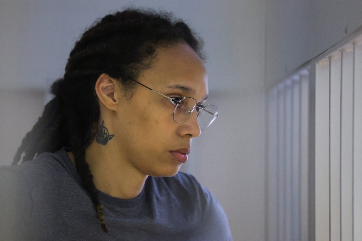 <i>Evgenia Novozhenina/Pool/Reuters</i><br/>Brittney Griner stands inside a defendants' cage before the verdict in a court hearing in Khimki outside Moscow on August 4. Griner has been transferred to a penal colony in Yavas