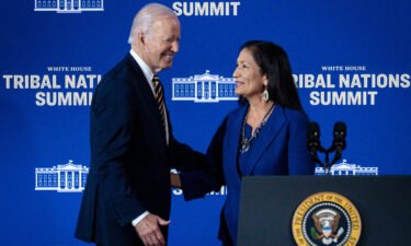 President Joe Biden greets Department of the Interior Secretary Deb Haaland during the 2022 White House Tribal Nations Summit at the Department of the Interior on November 30 in Washington