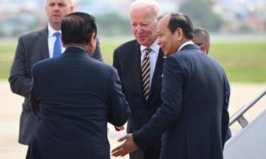 President Joe Biden is greeted by Cambodian officials upon arrival in Phnom Penh International Airport on November 12.