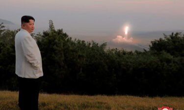 North Korea's leader Kim Jong Un oversees a missile launch at an undisclosed location