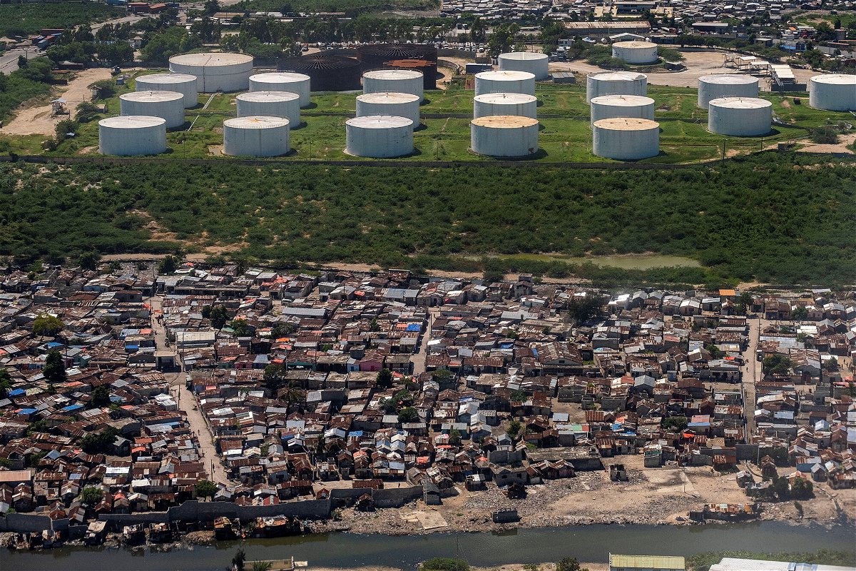 <i>Ricardo Arduengo/Reuters</i><br/>Haiti police confirmed that the Varreux terminal is now under police control. This image shows an aerial view of Cite Soleil and the fuel terminals of Varreux in Port-au-Prince