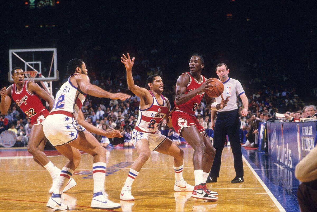 <i>John Iacono/Sports Illustrated/Getty Images</i><br/>Chicago Bulls Michael Jordan (23) in action vs Washington Bullets Jeff Malone (24) at Capital Centre. Jordan wearing red Nike Air Jordan 1 sneakers.