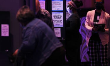 People cast their ballot during the Midterm Elections at Fox Theatre on November 8 in Atlanta