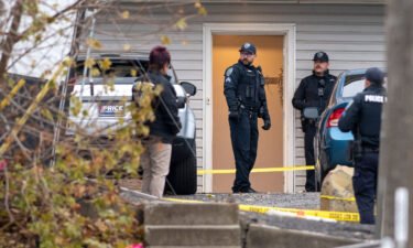 Officers investigate a homicide at an apartment complex south of the University of Idaho campus on Sunday