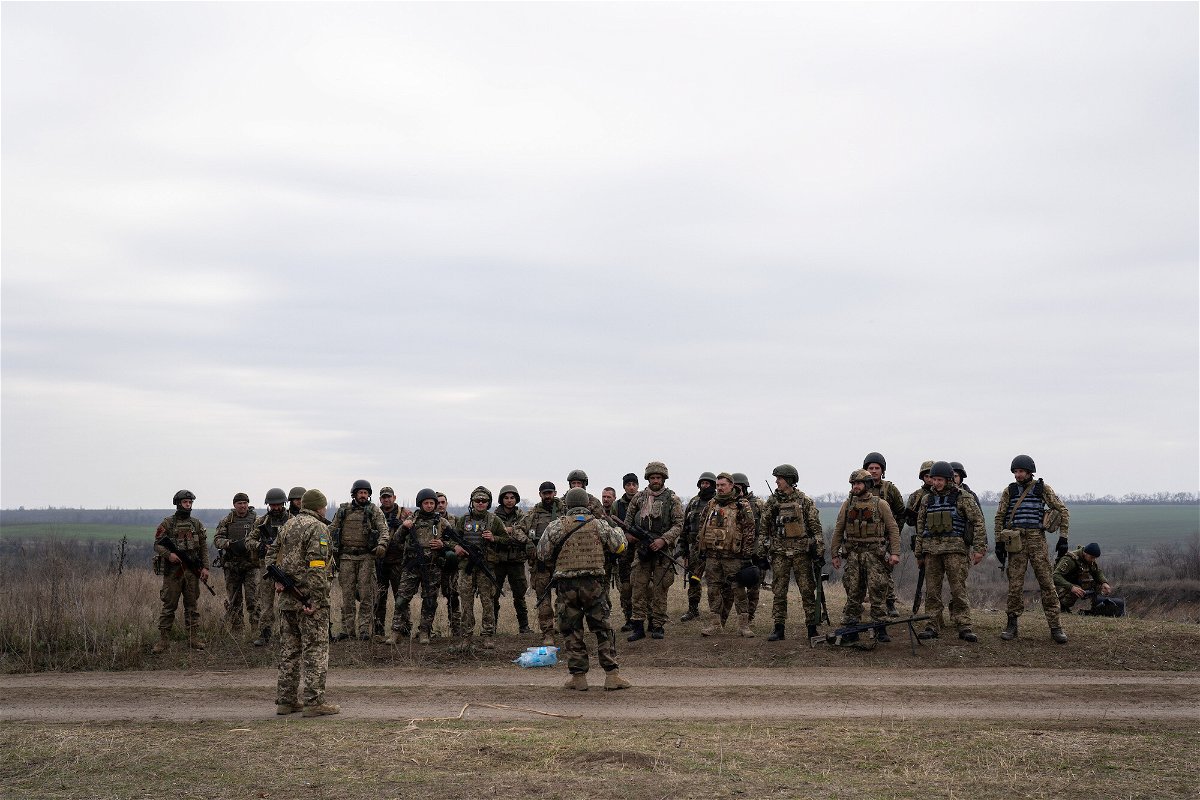 <i>Ashley Chan/SOPA Images/LightRocket/Getty Images</i><br/>Ukrainian soldiers are seen here after military training simulating an attack in the trenches for the counteroffensive to recapture Kherson.
