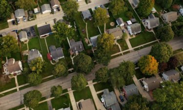 Fannie Mae and Freddie Mac will back loans of more than $1 million. Pictured is an aerial view of a suburban neighborhood in the United States.