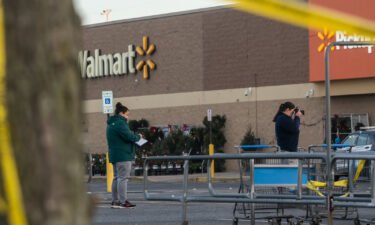 Members of the FBI investigate Tuesday's fatal shooting at the Chesapeake Walmart Supercenter on November 24