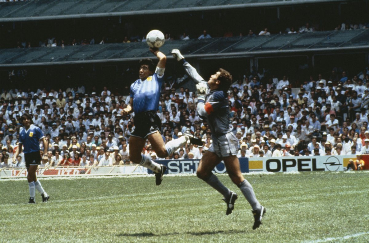 <i>Bob Thomas/Getty Images/file</i><br/>Diego Maradona of Argentina handles the ball past Peter Shilton of England to score the opening goal of the World Cup Quarter Final at the Azteca Stadium in Mexico City