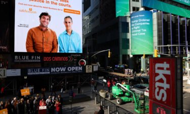 A public service announcement about the Adult Survivors Act plays in Times Square on November 18.