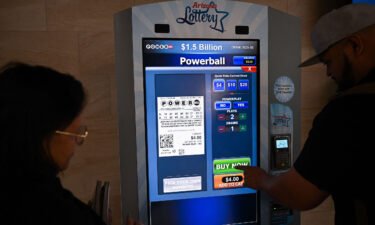 The "world's largest lotto prize ever offered" -- an estimated $1.6 billion jackpot -- is now at stake in Saturday's Powerball drawing. People purchase lottery tickets inside the Phoenix Sky Harbor International Airport in Arizona