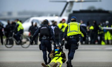 Hundreds of climate protesters staged a huge scale demonstration and blocked a runway at Schiphol airport in the Netherlands.