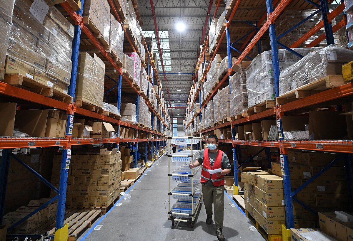 <i>Wang Gang/China News Service/Getty Images</i><br/>Alibaba's third quarter sales miss forecasts.  Pictured is an Alibaba warehouse on November 2
