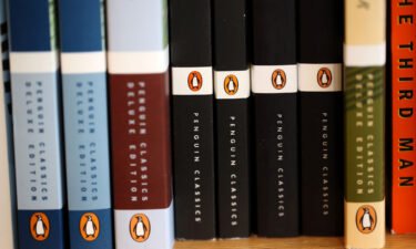 The Penguin logo is visible on the spines of books displayed on a shelf at Book Passage in November 2021 in Corte Madera