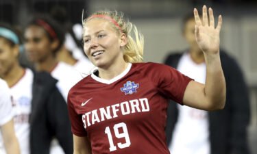 Stanford goalkeeper Katie Meyer acknowledges the crowd after the team's win over UCLA in a semifinal of the NCAA Division I women's soccer tournament in San Jose