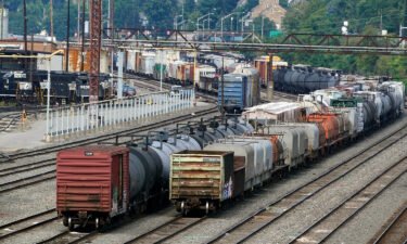 The nation's largest rail union rejected a tentative labor deal with freight railroads. Freight cars here wait to be hauled out of the Norfolk Southern Conway Terminal in Conway