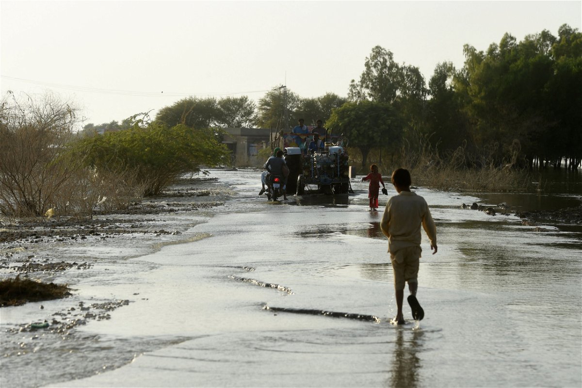 <i>Asif Hassan/AFP/Getty Images</i><br/>People displaced from their homes by flooding in Pakistan in Dadu