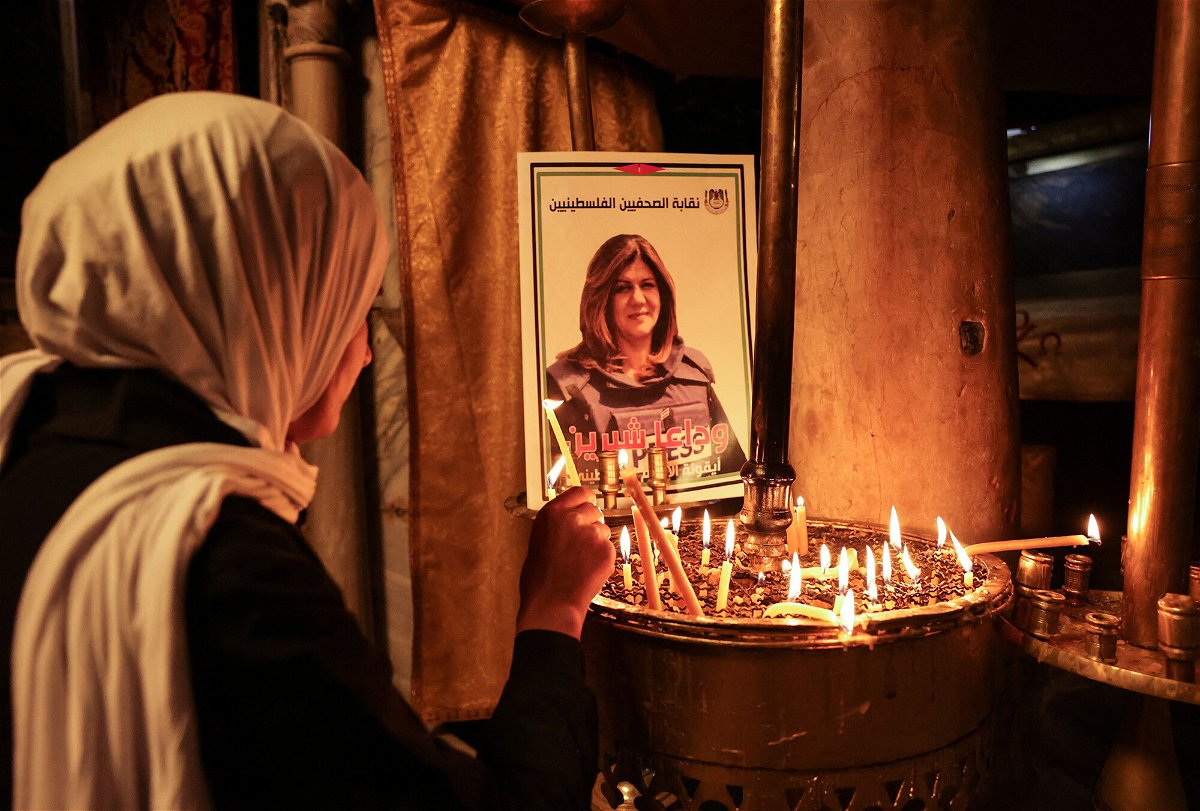 <i>Hazem Bader/AFP/Getty Images</i><br/>Members of the public paid tribute to the veteran Al Jazeera journalist following her death.