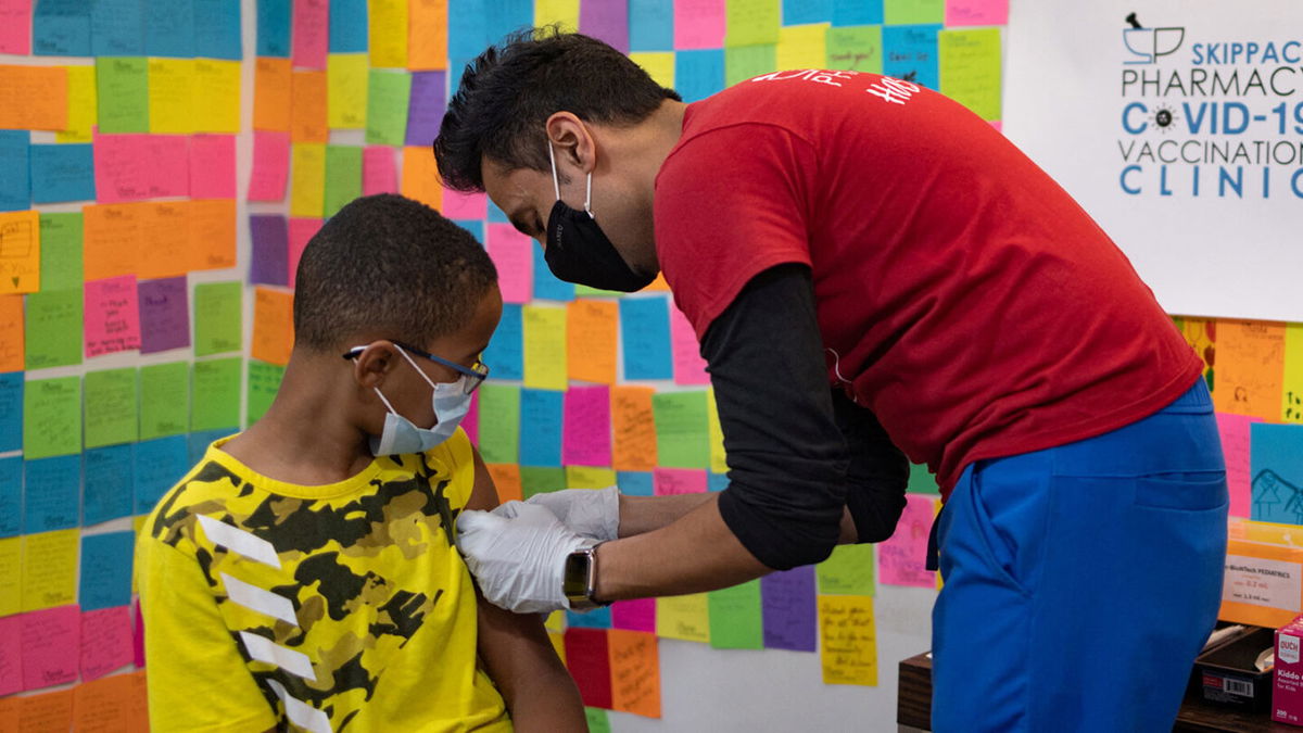 <i>Hannah Beier/Reuters/FILE</i><br/>Covid-19 boosters could keep thousands of kids out of hospitals. 10-year-old Ernest