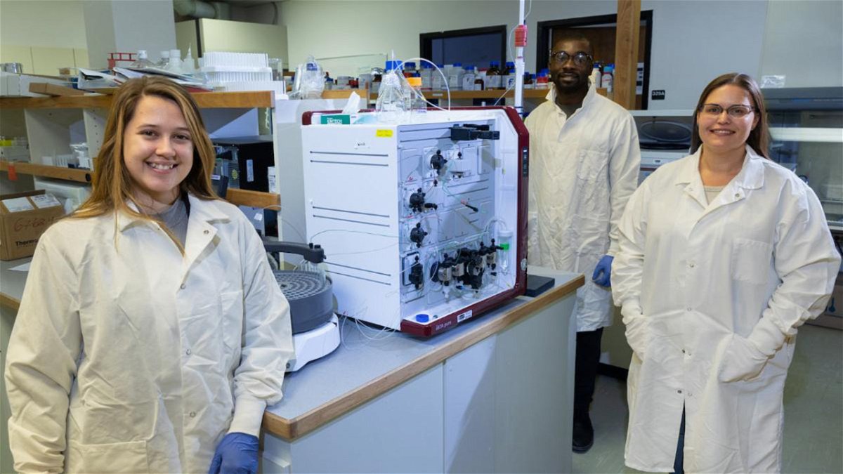 From left to right, Crystal Lovato, undergraduate student, Reuben Opoku, master’s student, and Julia Martin, associate professor in Idaho State University’s Department of Biological Sciences, pose for a photo in Martin’s lab on ISU’s Pocatello campus.