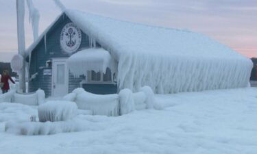 Ice-covered gift shop Simply Scandinavian is coated in a thick layer of ice and has become a temporary tourist attraction for Gills Rock