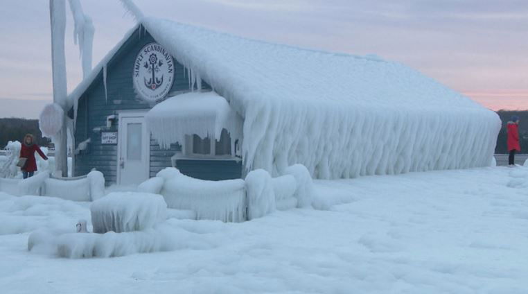 <i></i><br/>Ice-covered gift shop Simply Scandinavian is coated in a thick layer of ice and has become a temporary tourist attraction for Gills Rock