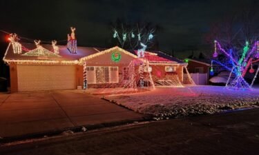 A Millcreek man is spreading Christmas cheer through tens of thousands of lights around his home