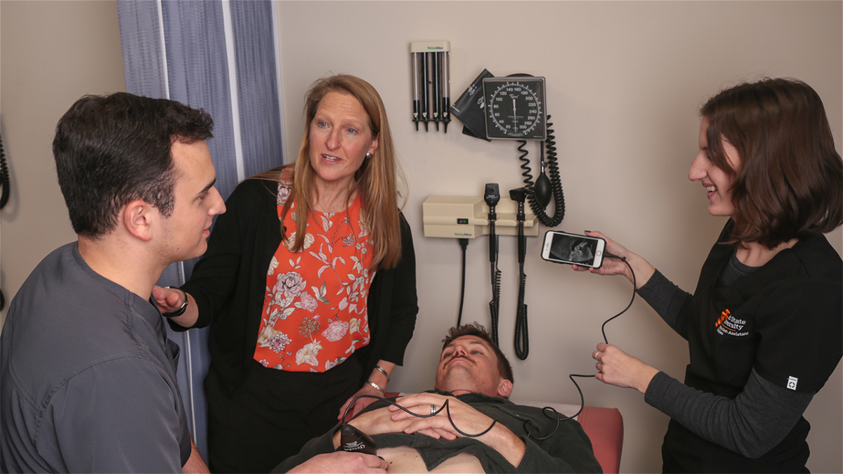 Students in Idaho State University’s Masters of Physician Assistant Studies program learn to perform a physical examination from professor Paula Phelps, MHE, PA-C.