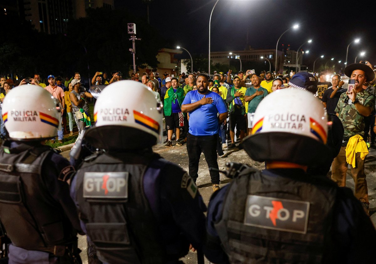 <i>Adriano Machado/Reuters/FILE</i><br/>Police officers stand guard  during a protest in Brasilia