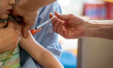 Children as young as 6 months can now receive an updated Covid-19 vaccine. A young child receives the Covid-19 vaccine in Needham