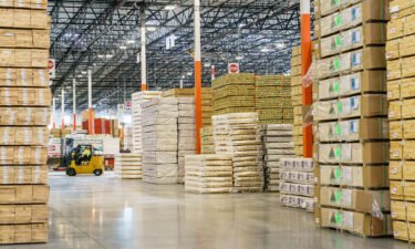 A key inflation measure shows price pressures cooled off in November. Pictured is a Home Depot distribution center in Stonecrest