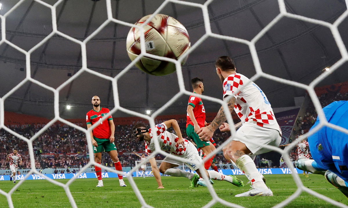 <i>Paul Childs/Reuters</i><br/>Croatia's Josko Gvardiol celebrates scoring a goal in his team's 2-1 win over Morocco to clinch third place in the World Cup.