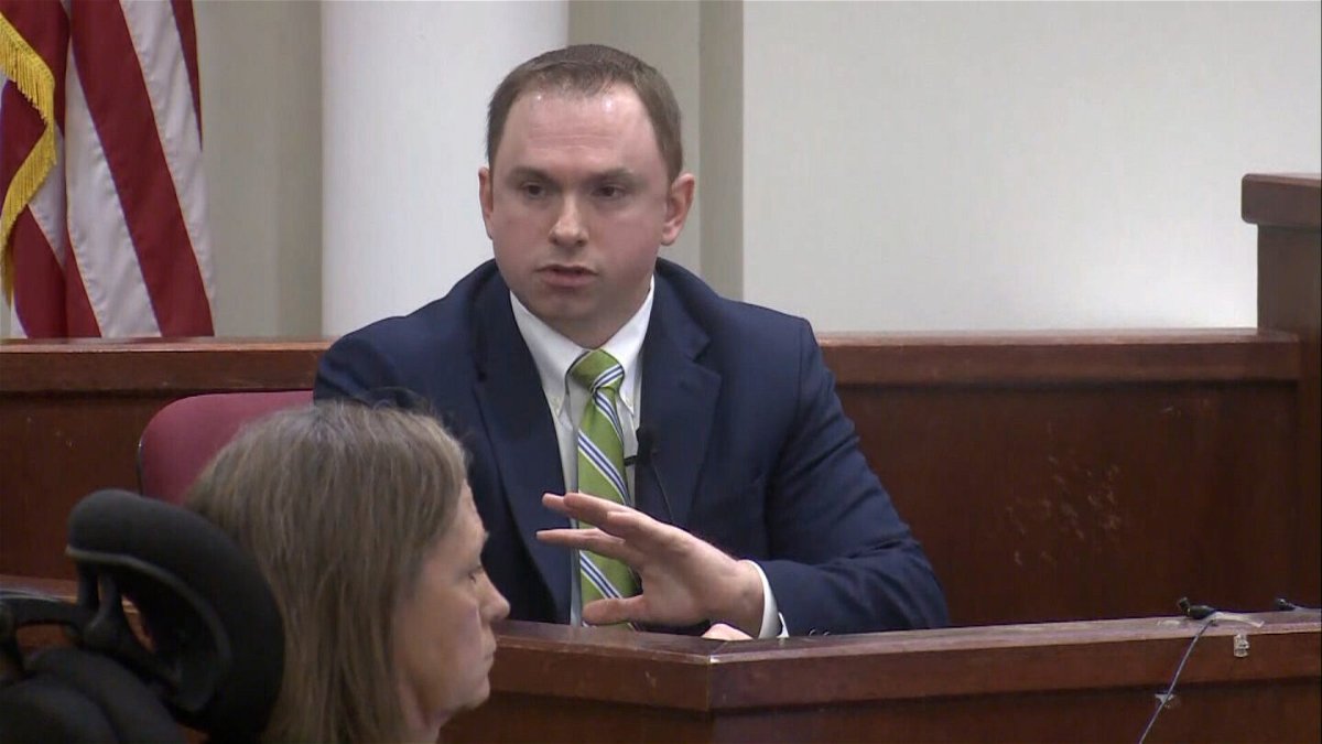 <i>Pool</i><br/>Aaron Dean testifies in his defense at his murder trial for the killing of Atatania Jefferson on December 12