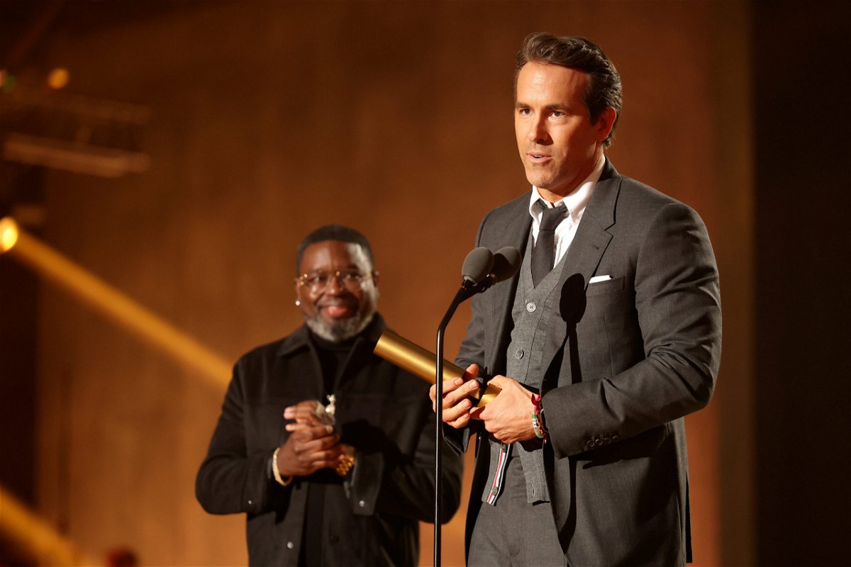 <i>Chris Polk/E! Entertainment/NBC/Getty Images</i><br/>Lil Rel Howery presents The People's Icon award to honoree Ryan Reynolds on Tuesday.