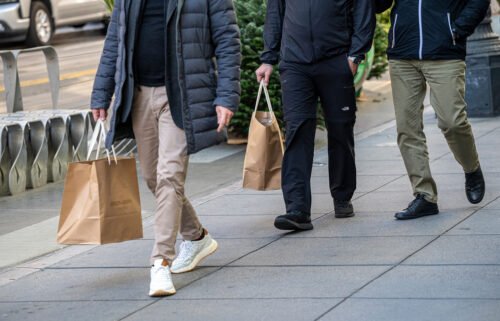 Slower hiring. Weaker spending. And softer growth. That's what America's CEOs are bracing for as the economy heads into 2023 facing a series of obstacles. Shoppers are pictured here in San Francisco on November 29.