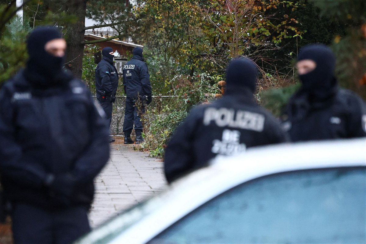 <i>Christian Mang/Reuters</i><br/>Police secure an area in Berlin after 25 suspected members and supporters of a far-right group were detained during raids across Germany on Wednesday.