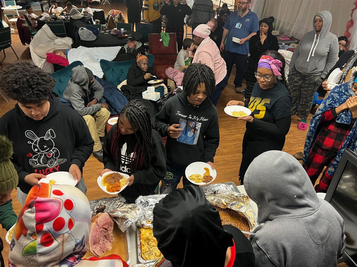 <i>Courtesy Al Robinson</i><br/>Families line up for food at Spirit Of Truth Urban Ministry in Buffalo