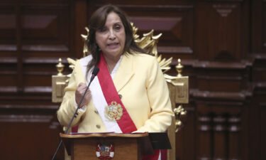 Former Vice President Dina Boluarte addresses lawmakers after being sworn-in as the new president at Congress in Lima
