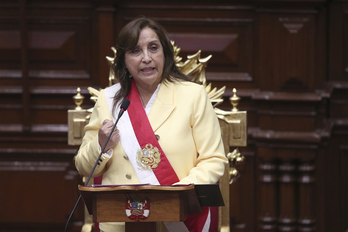 <i>Guadalupe Pardo/AP</i><br/>Former Vice President Dina Boluarte addresses lawmakers after being sworn-in as the new president at Congress in Lima