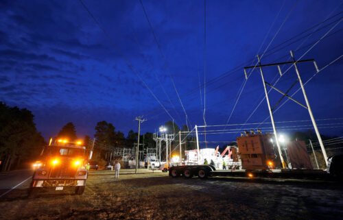 Duke Energy personnel work to restore power at a crippled electrical substation that was attacked over the weekend in North Carolina. US officials have been concerned about such attacks by domestic extremists for years.
