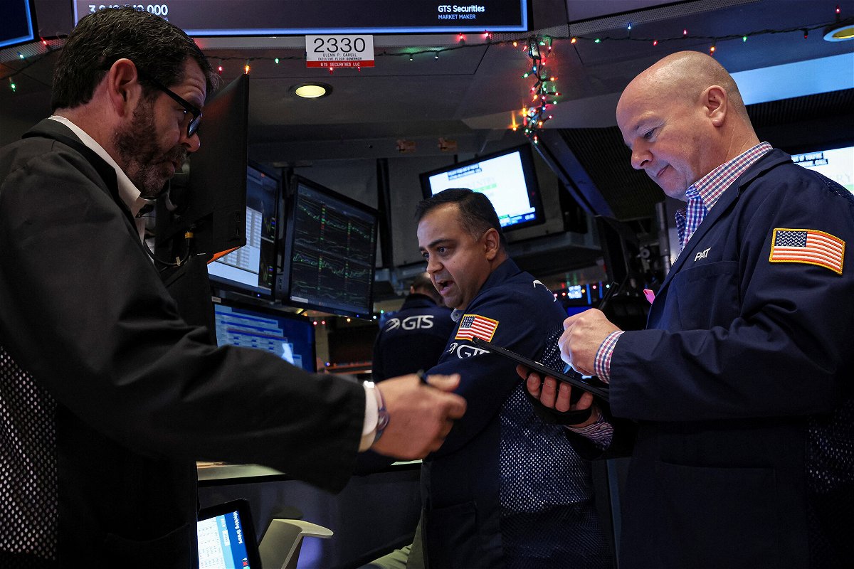 <i>Brendan McDermid/Reuters</i><br/>This week might be the most stressful time of the year for investors. Traders work on the floor of the New York Stock Exchange on December 7.