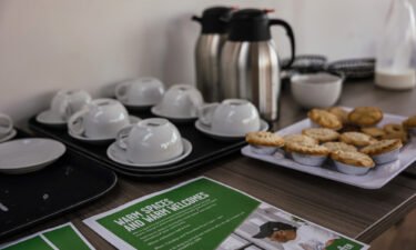Flyers advertising the warm spaces service alongside complimentary refreshments for visitors