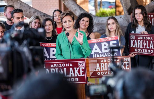 Kari Lake holds a press conference in front of her campaign headquarters in Phoenix