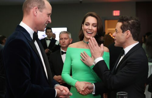 Prince William and Kate chat with actor Rami Malek at the awards.