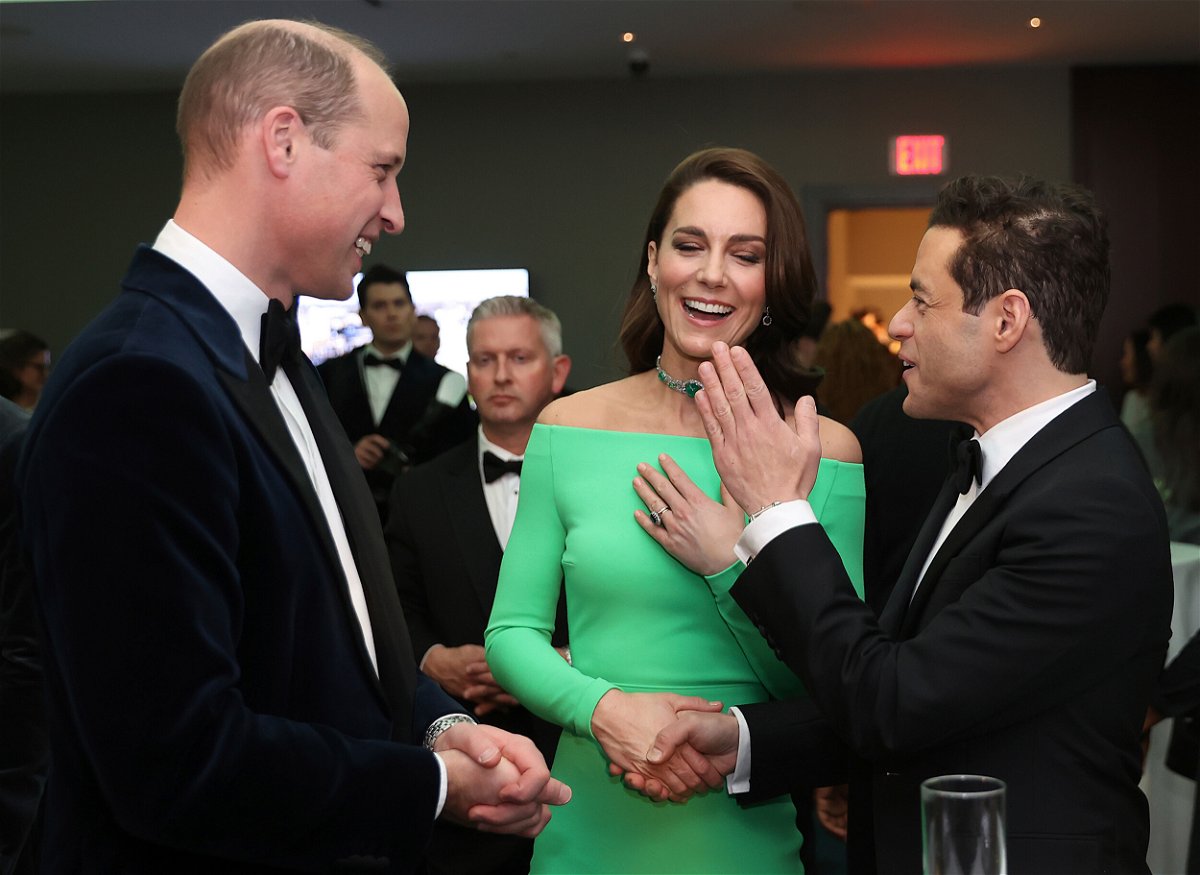 <i>David L. Ryan/Pool/The Boston Globe/AP</i><br/>Prince William and Kate chat with actor Rami Malek at the awards.