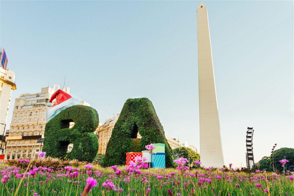 <i>Shutterstock</i><br/>The 'B' and 'A' in downtown Buenos Aires are adorned with a Santa hat and presents for Christmas.